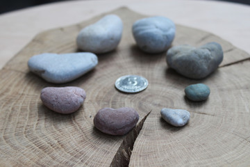Fototapeta na wymiar Colorful beach found stone hearts