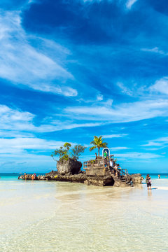 Fototapeta Willy's rock on the beach at Boracay, Philippines. Copy space for text. Vertical.