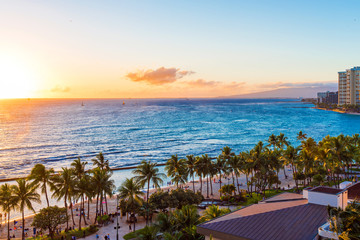 View of the Waikiki beach at sunset, Honolulu, Hawaii. Copy space for text. - obrazy, fototapety, plakaty
