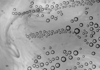 bubbles in water close-up black-and-white background