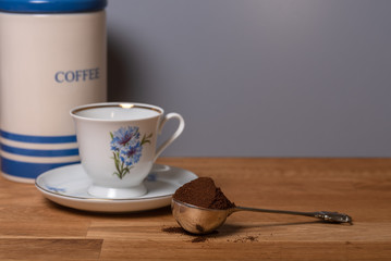 cup of coffee on wooden table