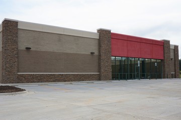 New construction store front with blank signage 