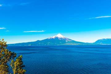 Fototapeta na wymiar Osorno volcano and Llanquihue lake, Parque, Puerto Varas, Chile. Copy space for text