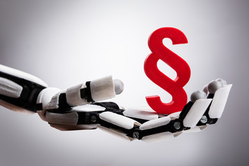 Robot Holding Paragraph Symbol