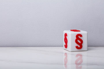 White Cubic Block With Red Paragraph Symbol