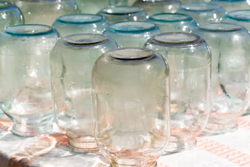 stylized glass jars under the sun