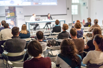 Media interview and round table discussion at popular scientific conference. Audience at the...