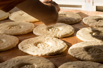 process of preparing Uzbek bread