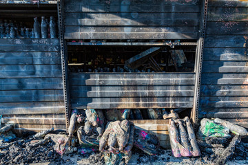 Close up Burned damaged ruins of destroyed supermarket metallic facade arson investigation insurance