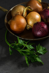 Fresh whole onions and parsley