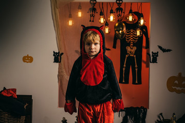 Fototapeta premium Halloween party and funny Pumpkin. Holiday halloween with funny carnival costumes on a halloween background.