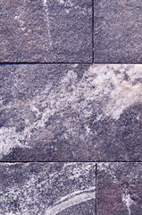 grey granite stone tiled background. architecture, texture.