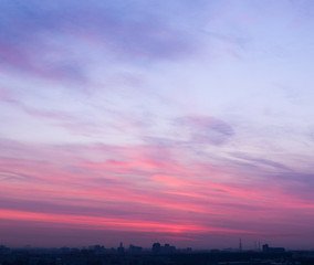 Fototapeta premium sunrise sky over the city at cold summer morning. background, nature.