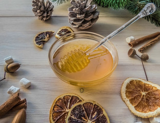 autumn still life with honey, marshmallows, pine and cones, lemo