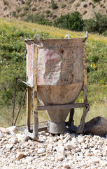 old iron pot for cement in nature