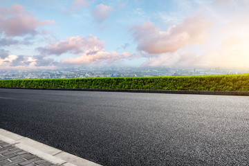 Panoramic skyline and buildings with empty road