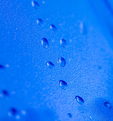 water drops on blue glass