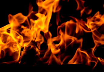 Fototapeta premium Fire flames on black background