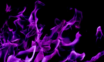 Purple fire flames on a black background