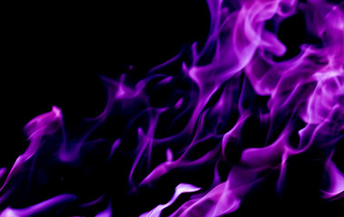 Purple fire flames on a black background