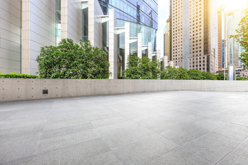 Empty square floor and modern city commercial building scenery