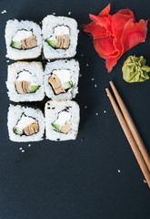 Rolls on black stone background.
