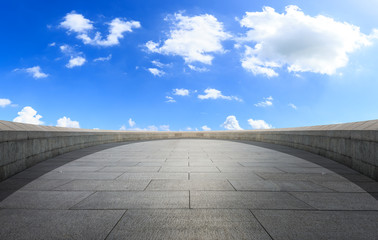 Empty square floor and blue sky white clouds