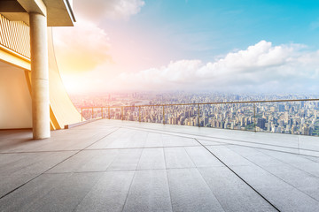 Panoramic skyline and buildings with empty concrete square floor