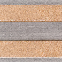 Fototapeta premium gray canvas seam with brown Fabric for use as banner or background