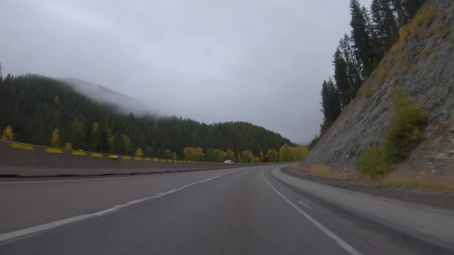 Early fall morning drive through the Bitterroot Mountains in Montana