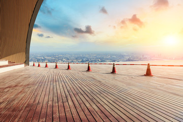 Panoramic Shanghai skyline and buildings with empty wooden square floor platform