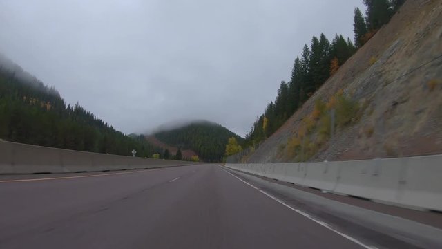 Early fall morning drive through the Bitterroot Mountains in Montana