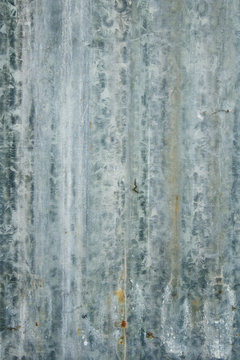background of peeling paint and rusty old metal. zinc wall texture pattern background rusty corrugated metal old decay. photo