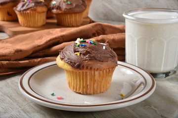 Homemade frosted yellow cupcake