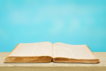 Open Holy bible book on background