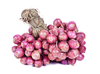 Shallot onions in a group on white background
