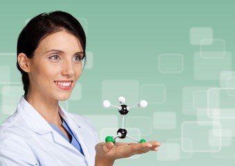 Close up of Molecular structure model in hand on background