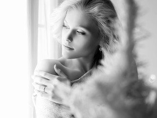 home lifestyle girl looking in window