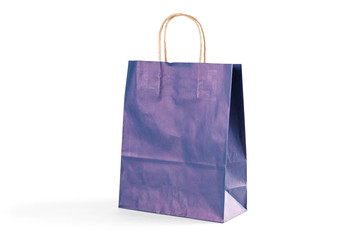 Gift blue paper bag on white background. Close up