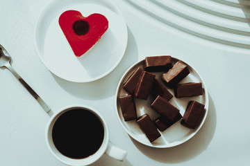 Heart-shaped Dessert With A Sweets And Coffee.