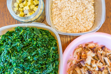 Egusi seed, spinach, seasoning cubes and dried fish to prepare Nigerian Soup