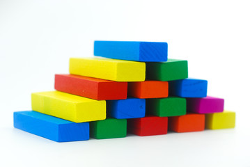 Arrangement of colorful wooden block on white background