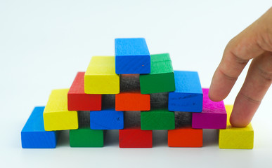 Arrangement of colorful wooden block on white background