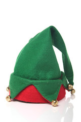 Christmas elf hat on a white surface