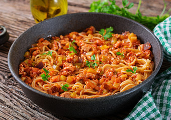 Spaghetti bolognese pasta with tomato sauce, vegetables and minced meat - homemade healthy italian...