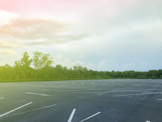 Fototapeta premium empty outdoor car parking lot at evening