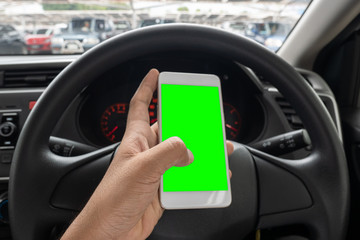using smartphone with green screen in the car.