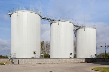 Exterior of oil storage tanks on the agricultural plant.