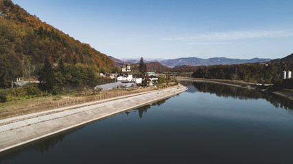 Cornet Monastery on Olt Valley River on a sunny day.