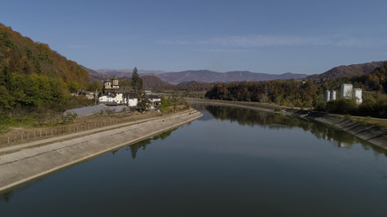 Cornet Monastery on Olt Valley River on a sunny day.